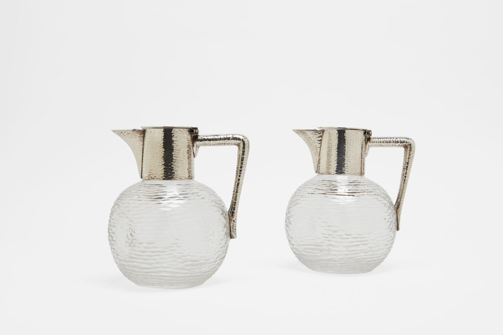 Pair of Christopher Dresser Glass Pitchers